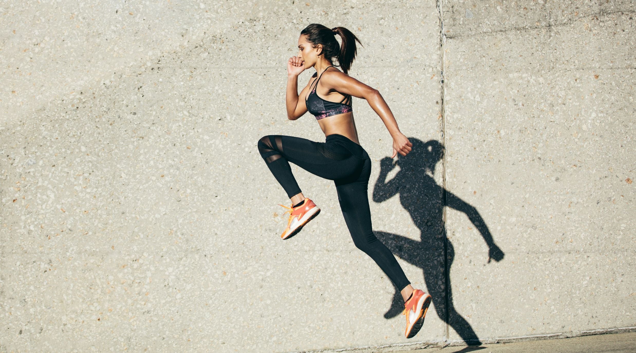 Athlete wearing a nasal strip while running, showcasing improved breathing and performance