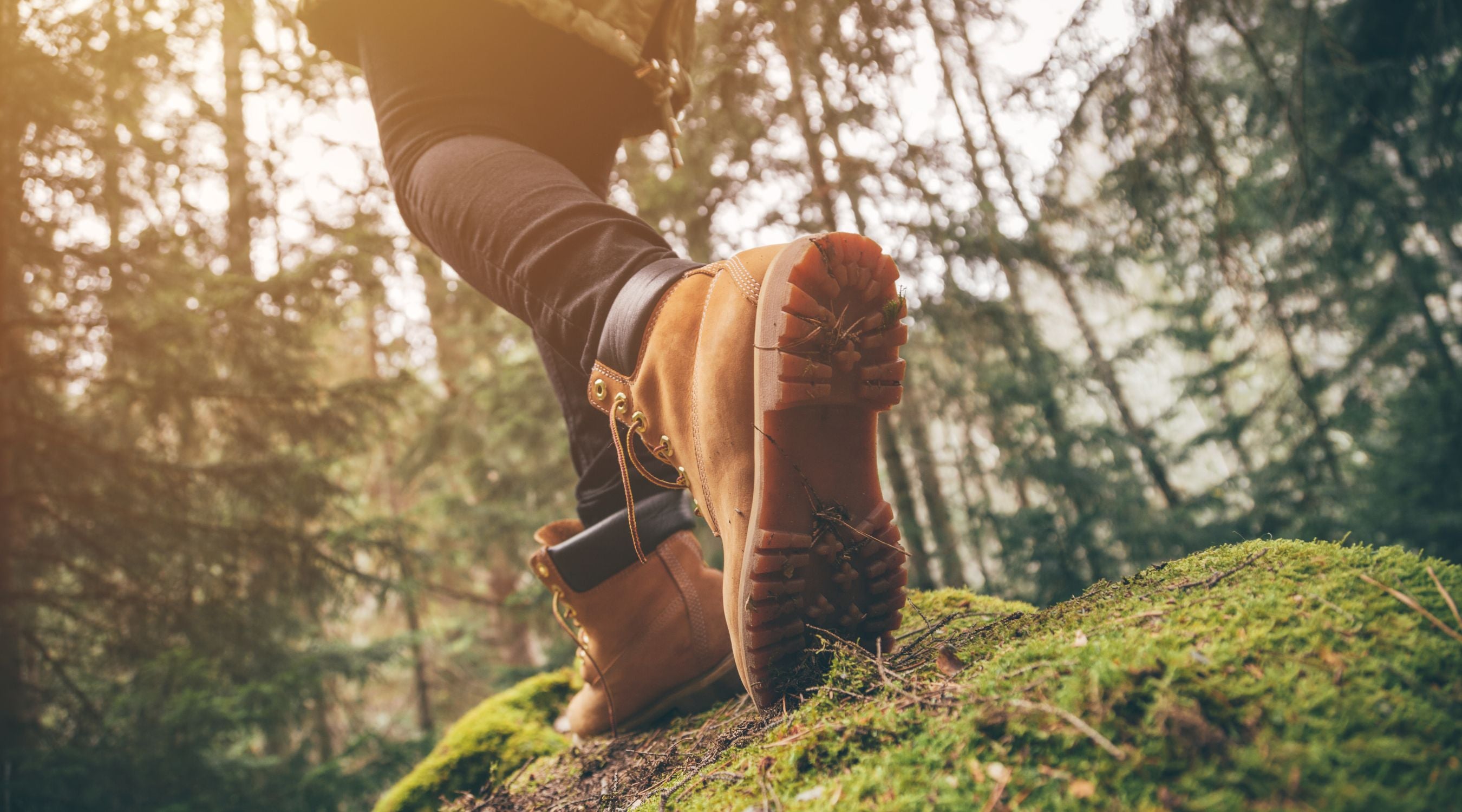 Hiker with Nozey Active Nasal Strip, taking in the scenic mountain view