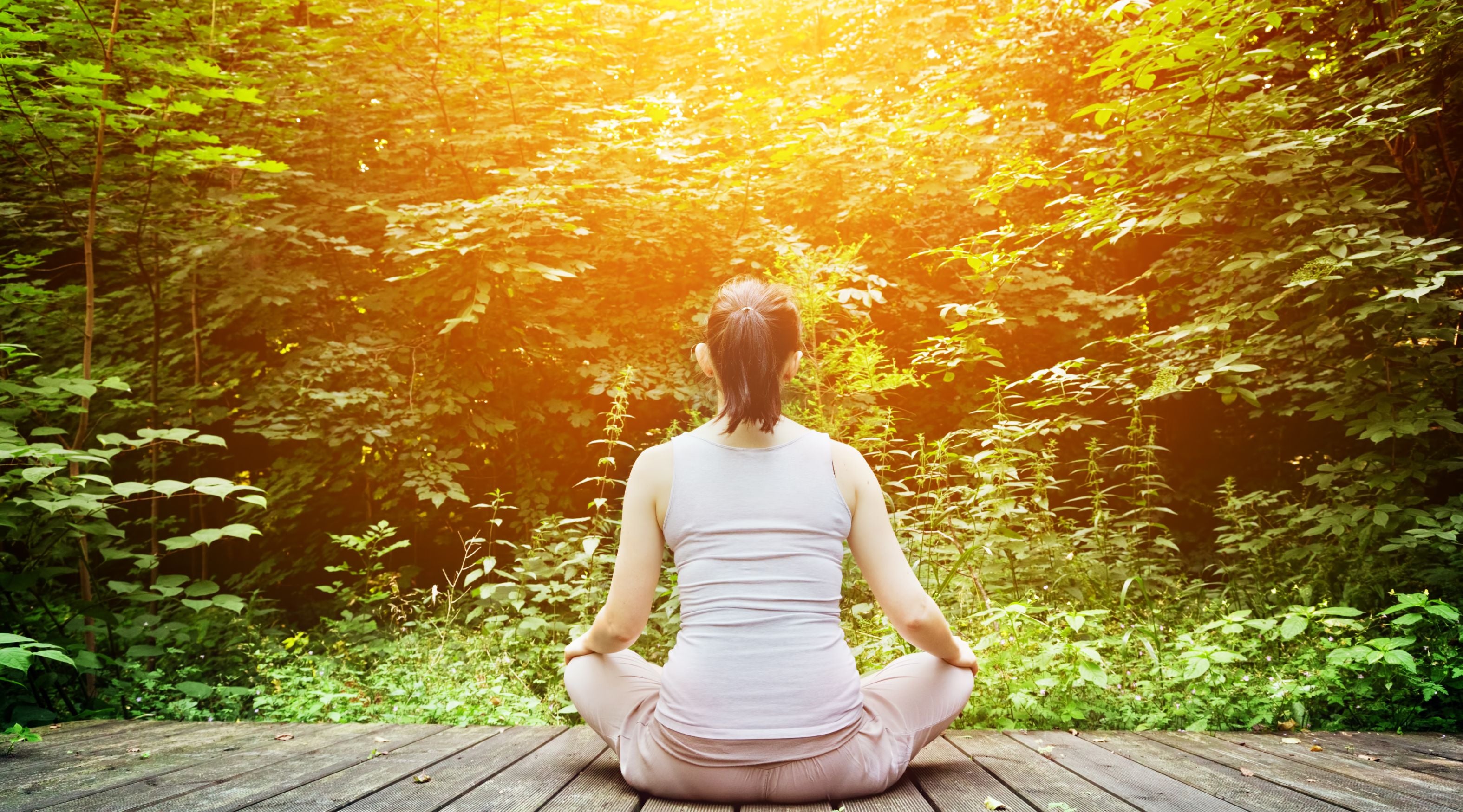 Woman meditating while focusing on nasal breathing